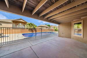 View of swimming pool featuring patio surround and a residential view