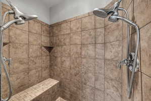 Bathroom with tiled shower