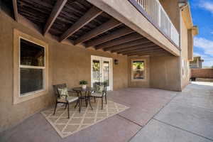 Patio / terrace featuring french doors, outdoor dining space, and a patio area