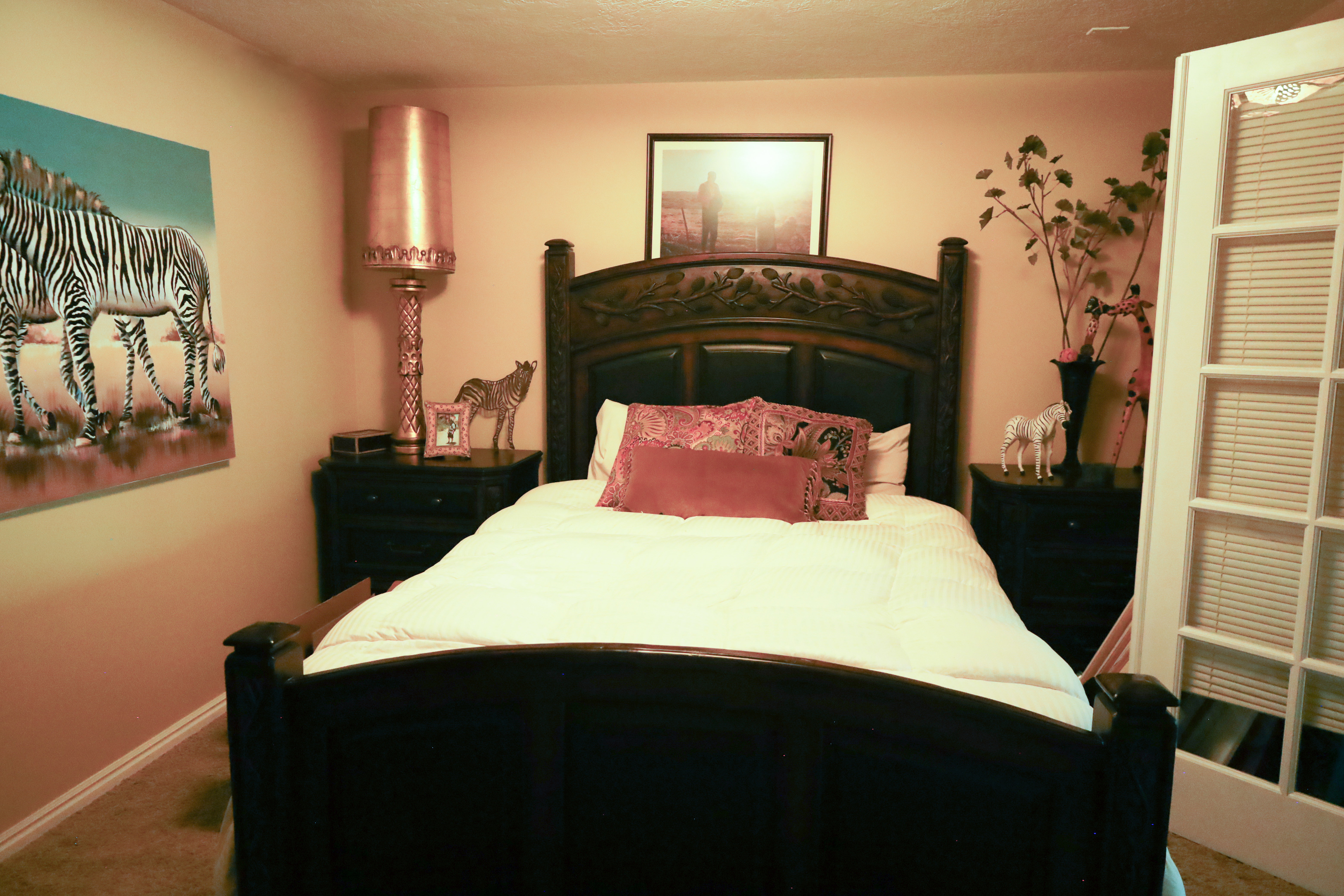 Bedroom featuring carpet flooring and baseboards