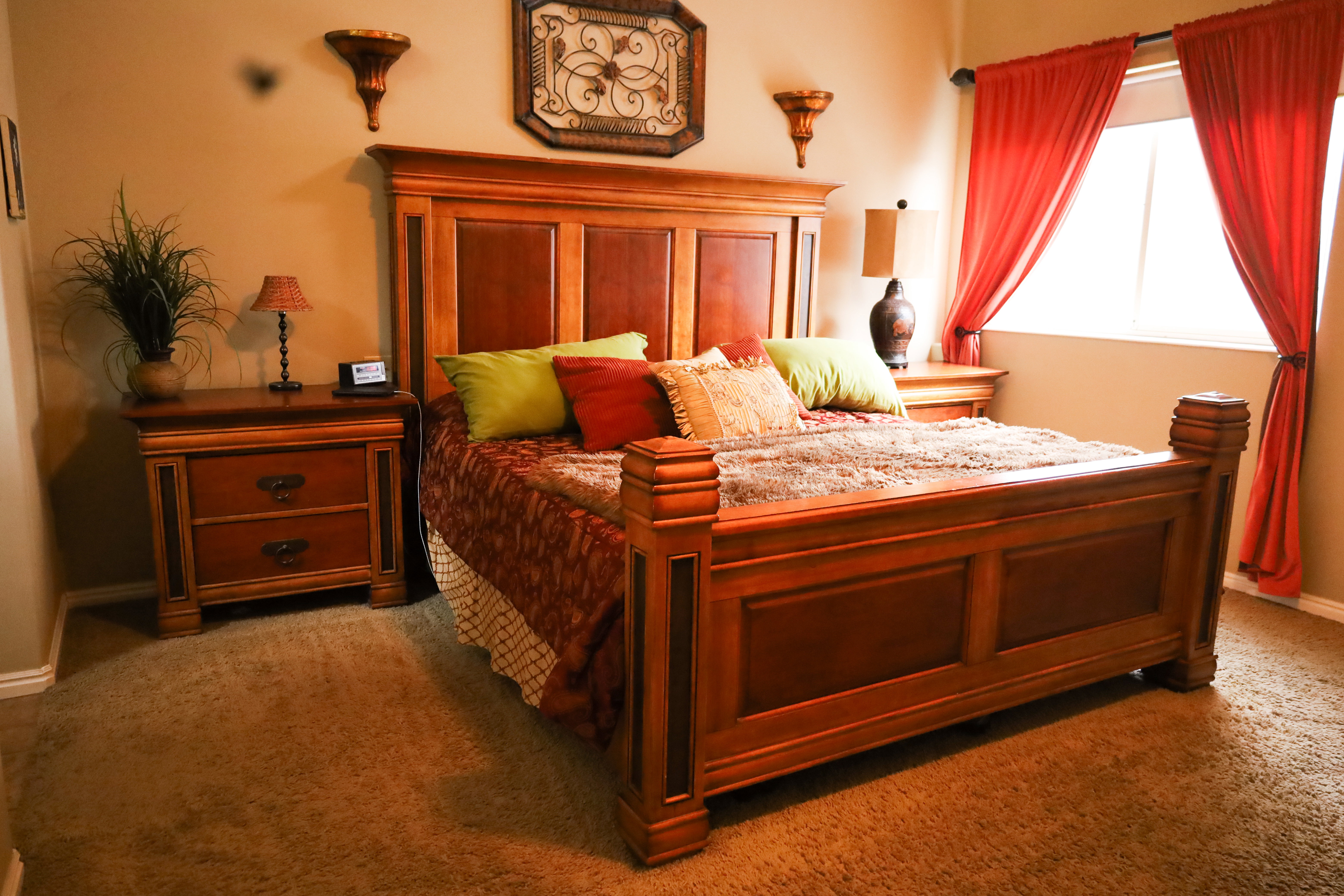 Bedroom with carpet flooring and baseboards