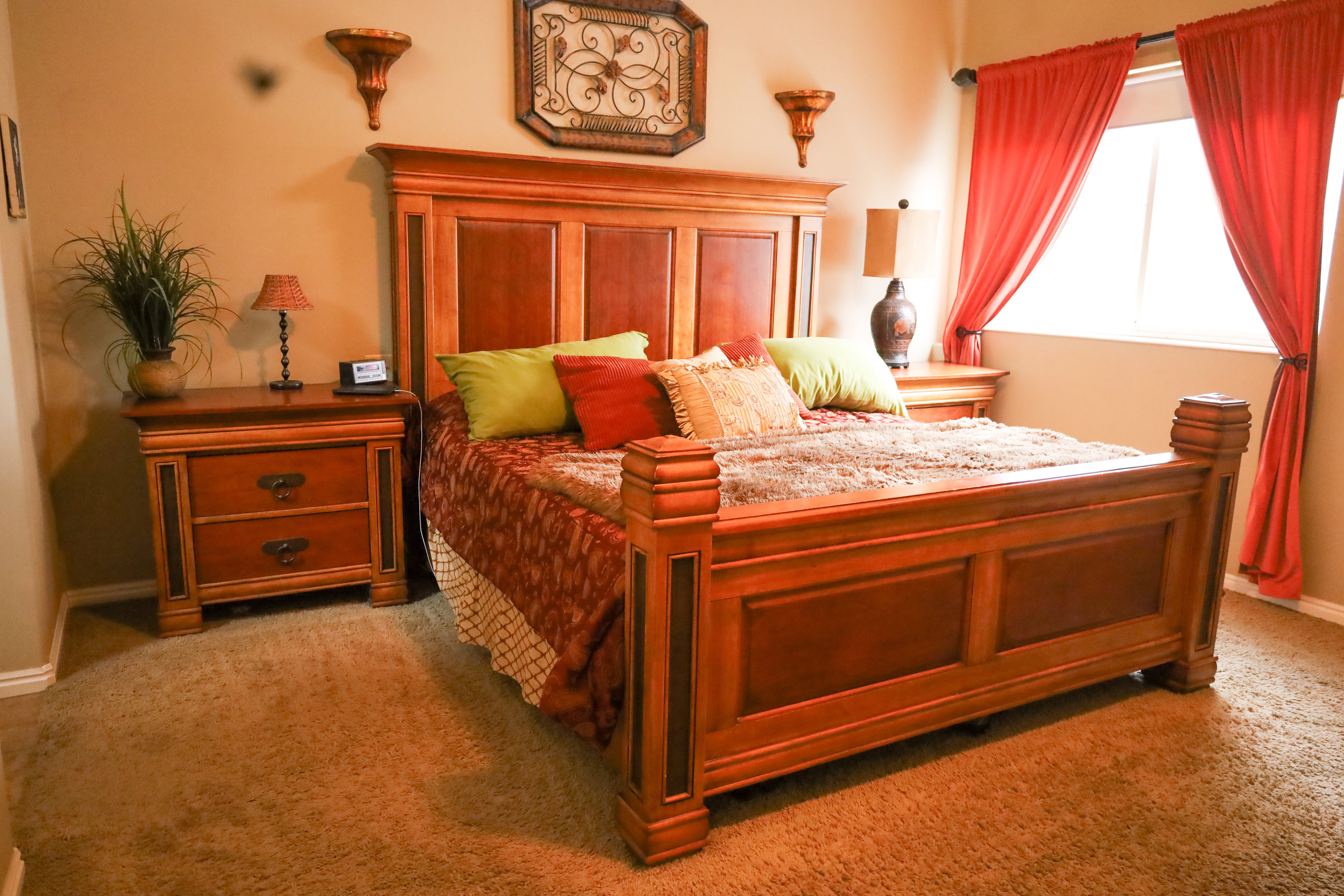 Carpeted bedroom featuring baseboards
