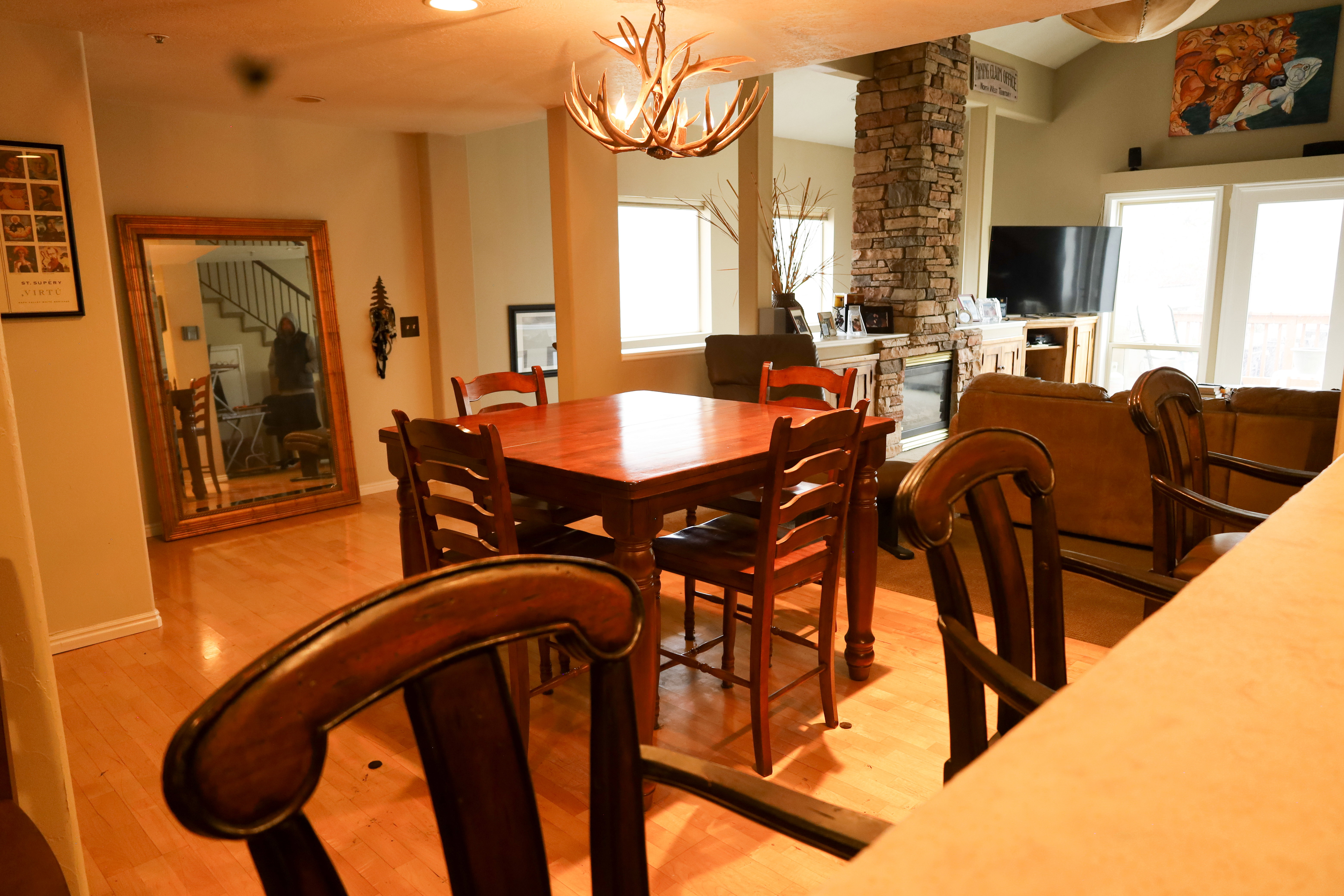 Dining space featuring a chandelier and light wood-type flooring