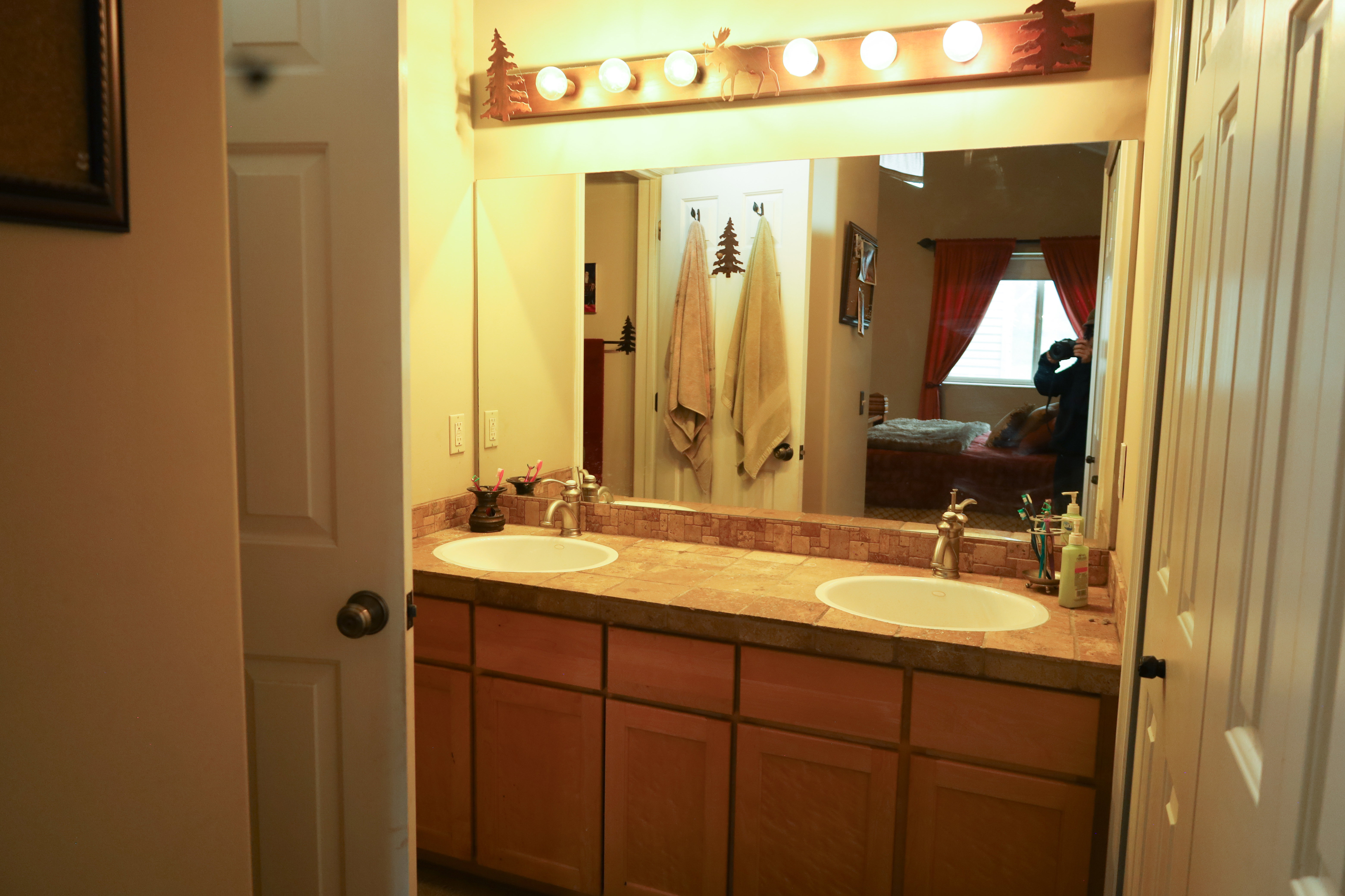 Bathroom with double vanity and ensuite bath