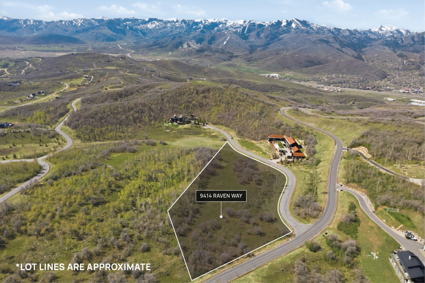 Aerial view of property's location with property boundaries highlighted and mountains