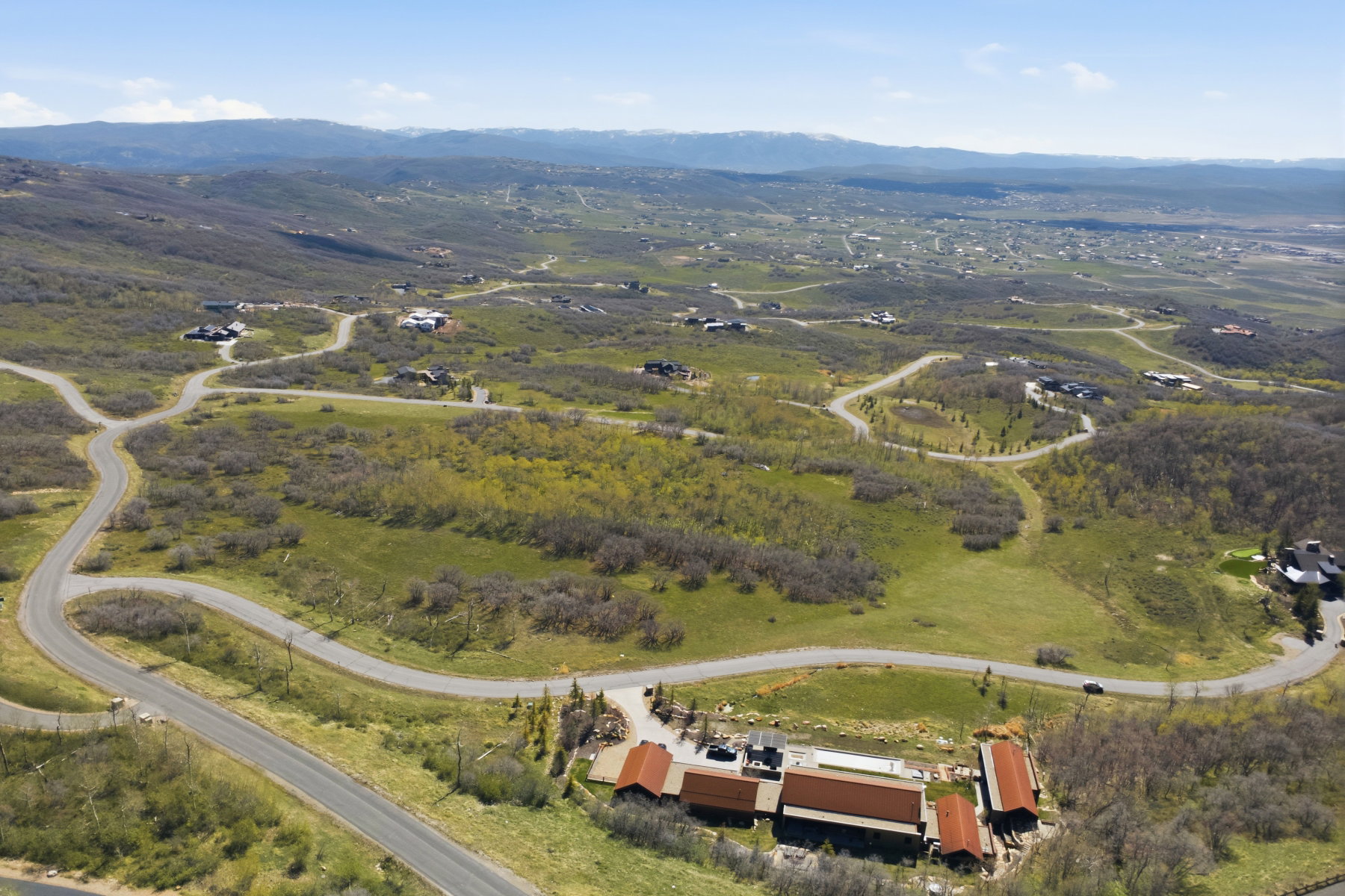 Drone / aerial view of a mountain backdrop