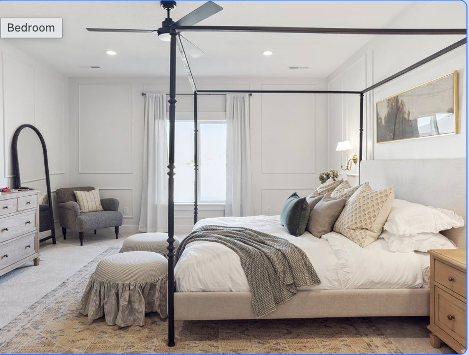 Carpeted bedroom featuring a decorative wall, ceiling fan, and recessed lighting
