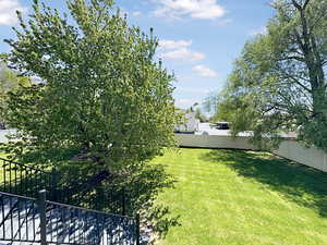 View of fenced backyard