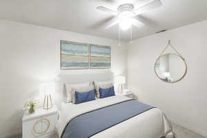 Bedroom featuring carpet flooring and ceiling fan