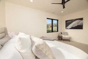 Bedroom with recessed lighting, carpet flooring, and a ceiling fan