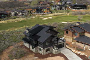Aerial perspective of suburban area with a golf course