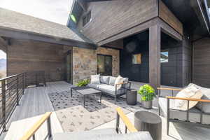 Deck featuring an outdoor lounge area