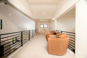 Sitting room with carpet flooring, an upstairs landing, recessed lighting, and lofted ceiling