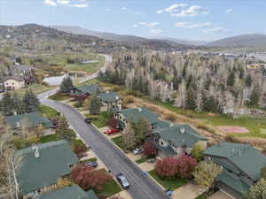 View of property location featuring a mountainous background and nearby suburban area