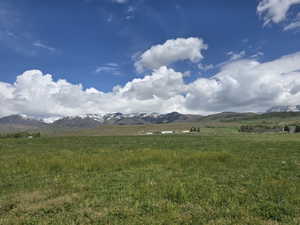 View of mountain background with rural landscape and a pastoral area