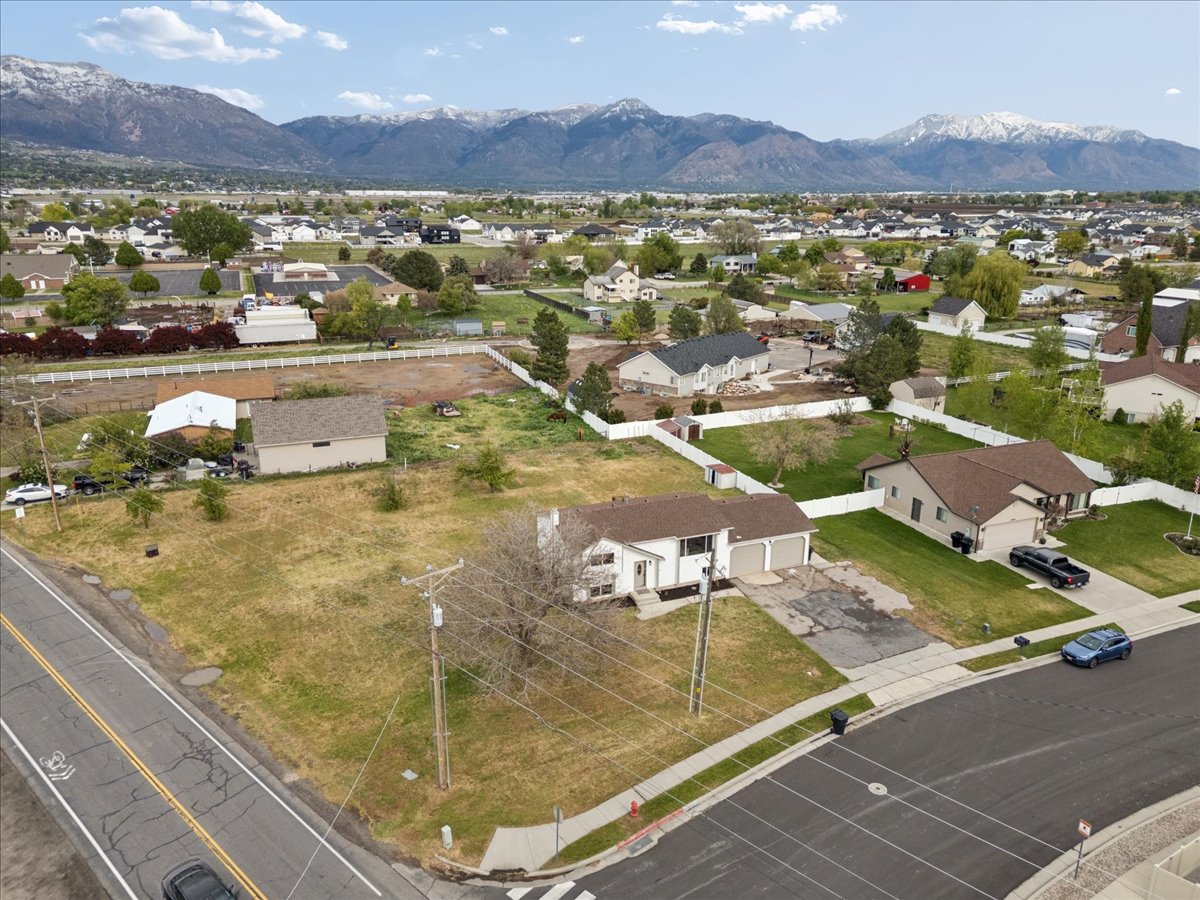 Aerial perspective of suburban area with mountains