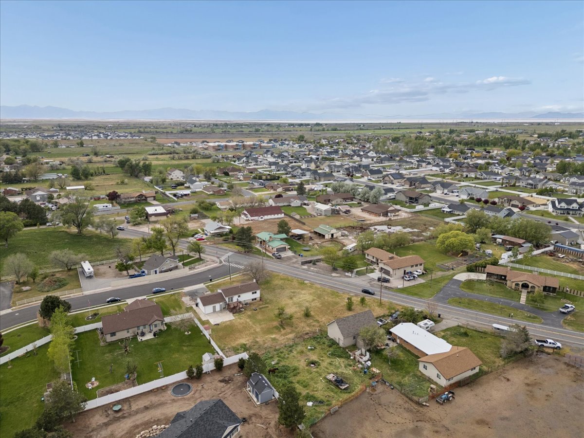 Aerial view of residential area with a mountain backdrop