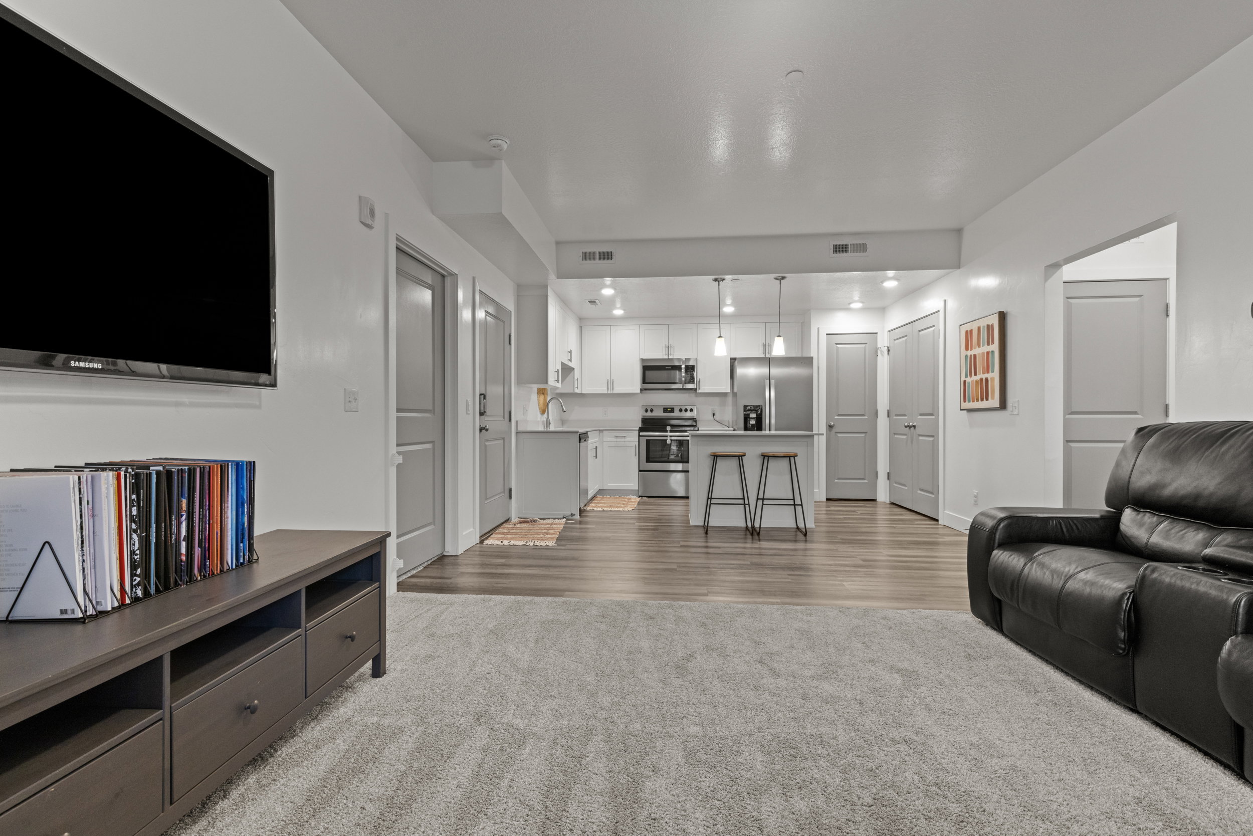 Living room featuring light colored carpet