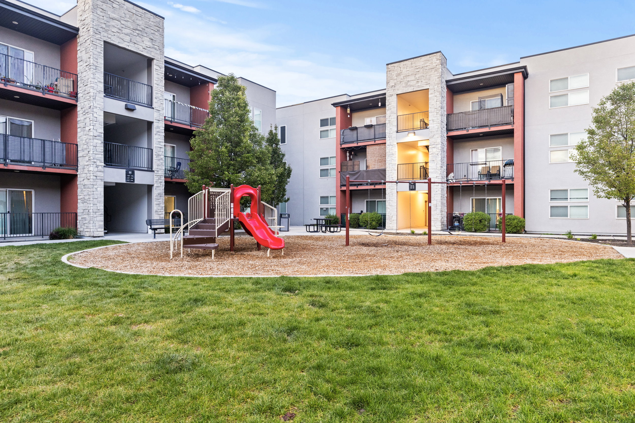 Community play area featuring a lawn