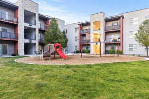 Community play area featuring a lawn