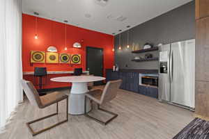 Dining space featuring light wood-style floors