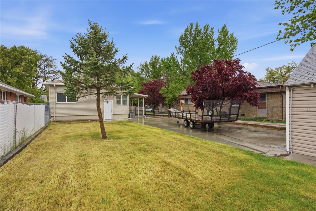 Fenced yard with a patio