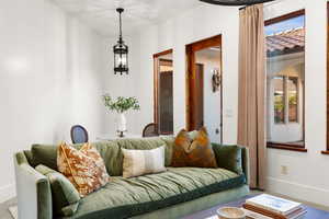 Living area featuring baseboards