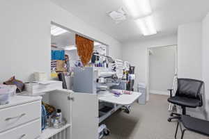 Office featuring a textured ceiling