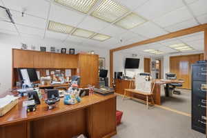 Office featuring a paneled ceiling