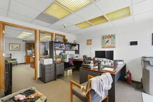 Home office with a paneled ceiling