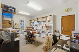 Office featuring a textured ceiling