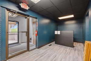 Miscellaneous room with a paneled ceiling