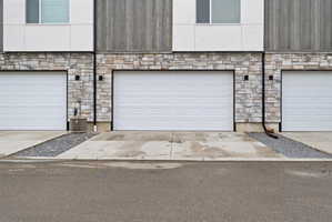 Garage with concrete driveway
