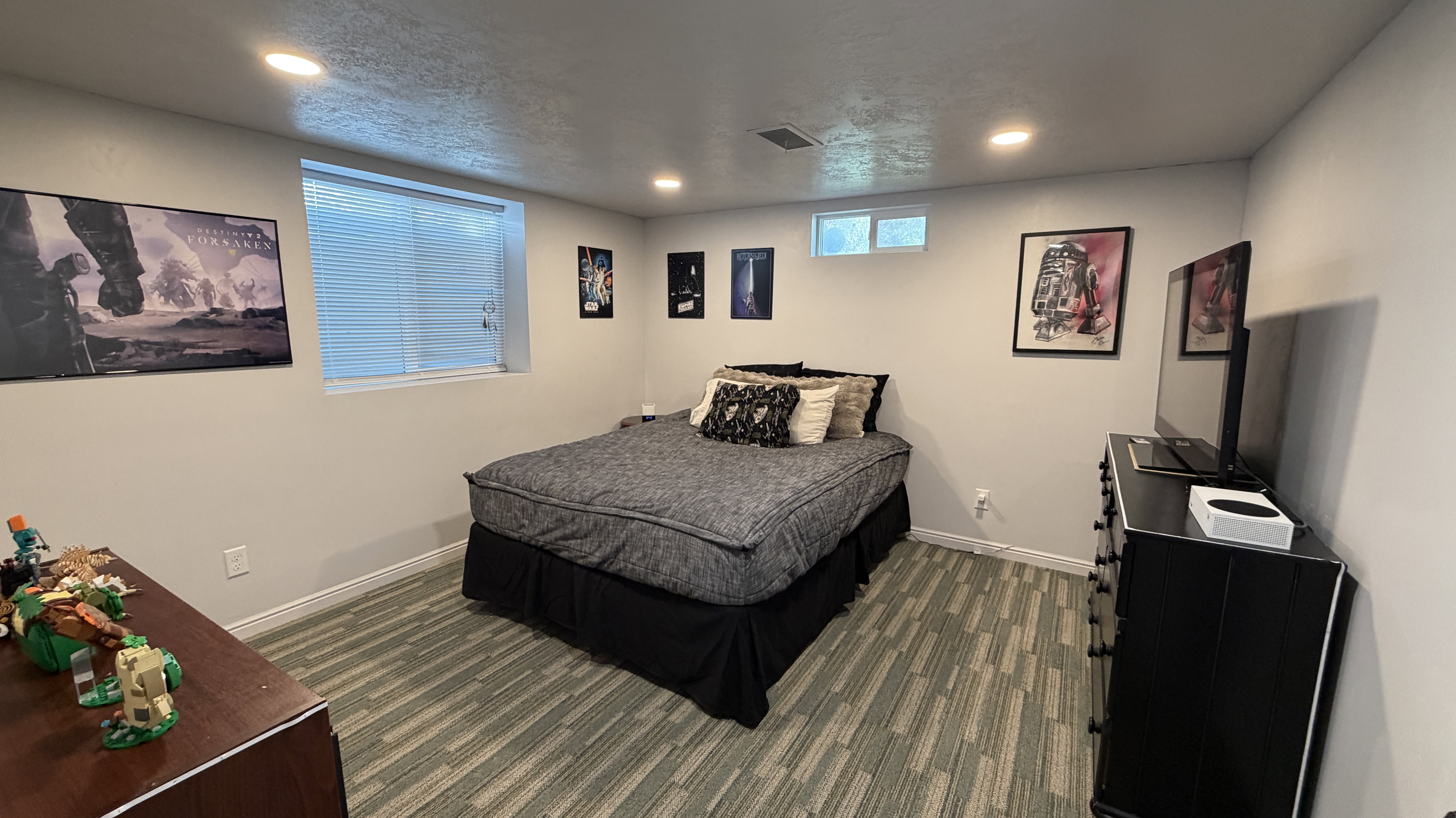 Bedroom 3, larger with recessed lighting, walk in closet and dark carpet