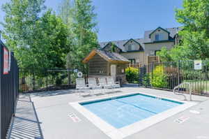 View of swimming pool featuring a pool