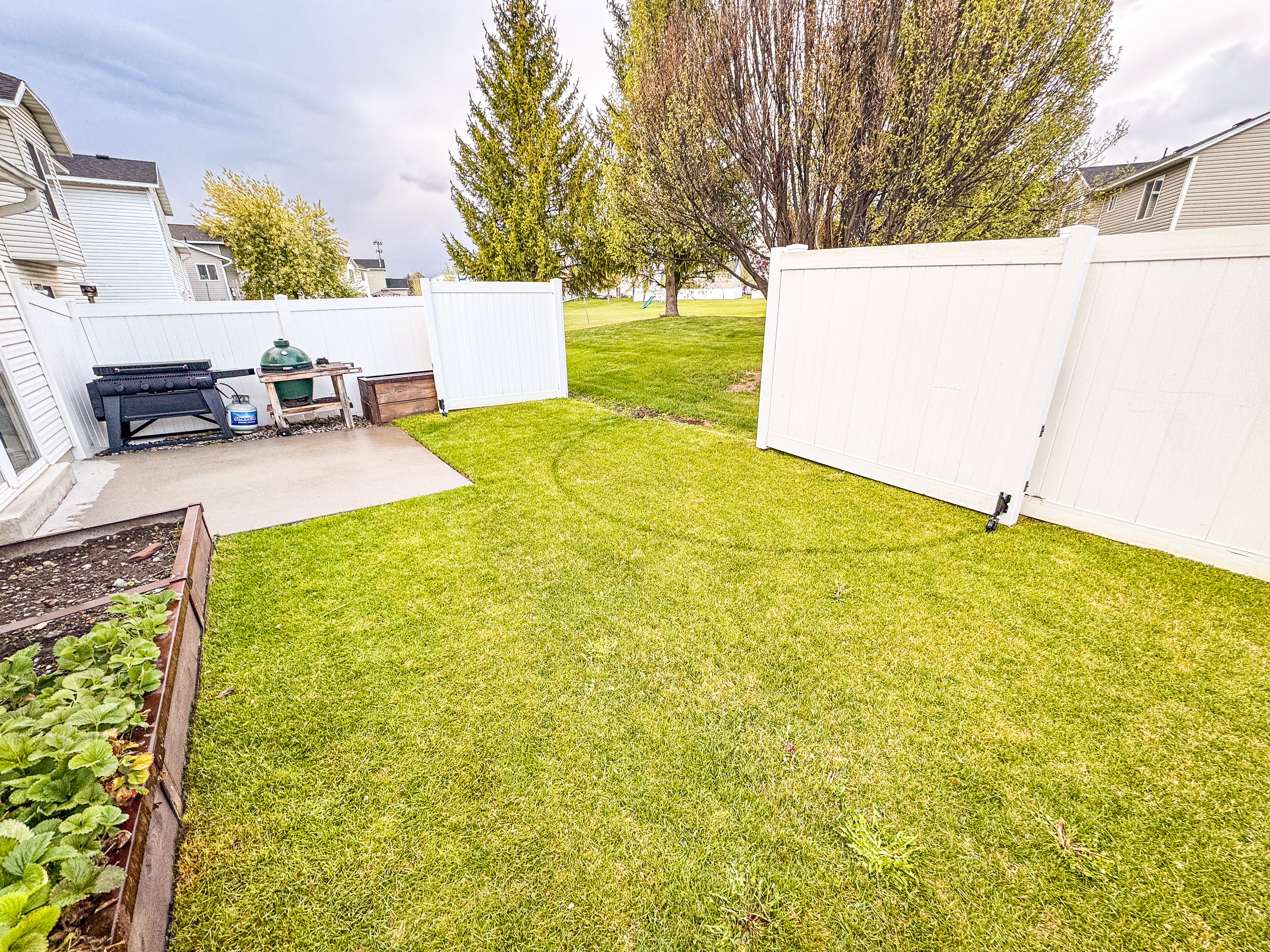 Fenced yard featuring a patio area
