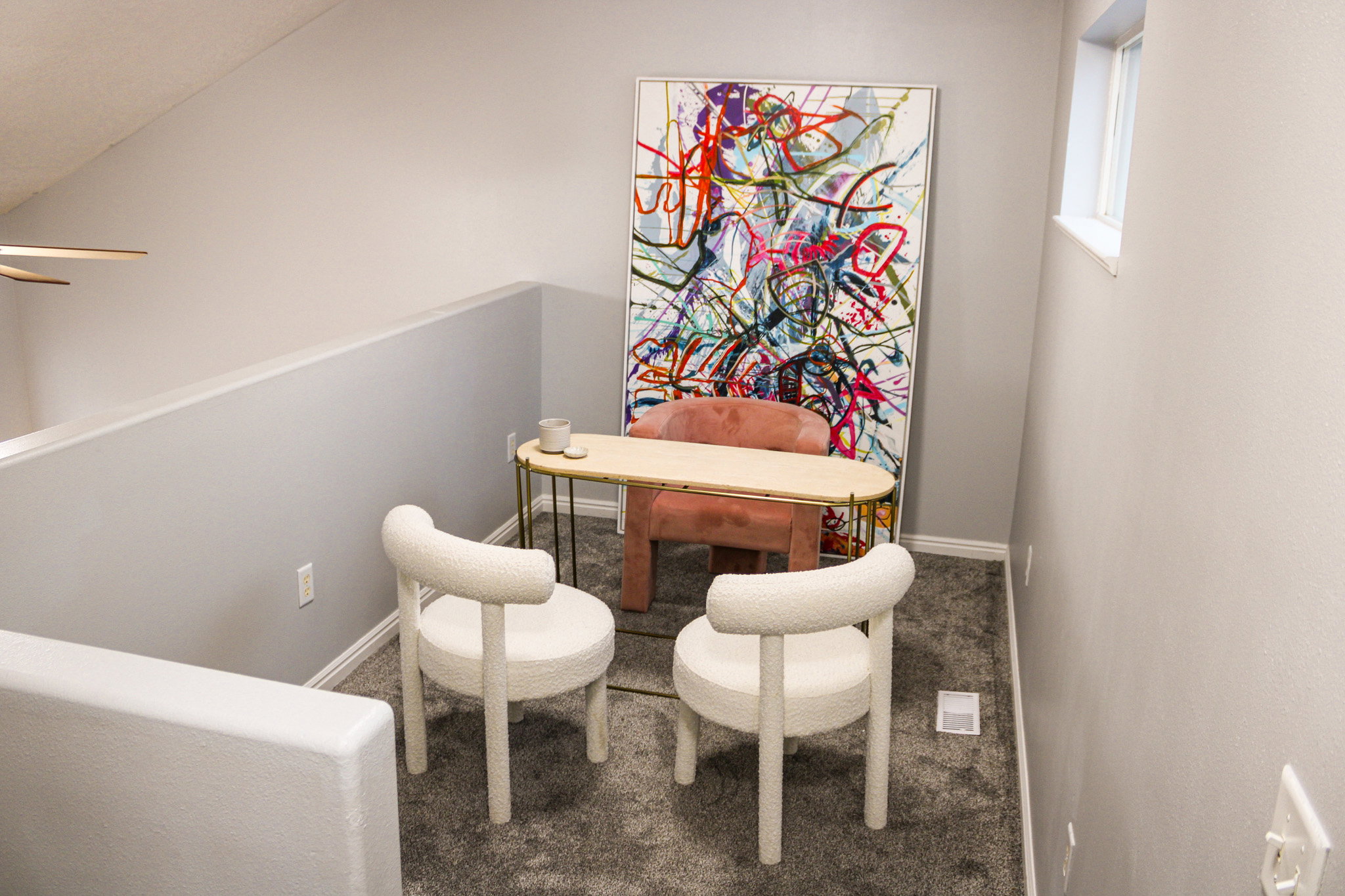 Dining space featuring carpet flooring and a ceiling fan