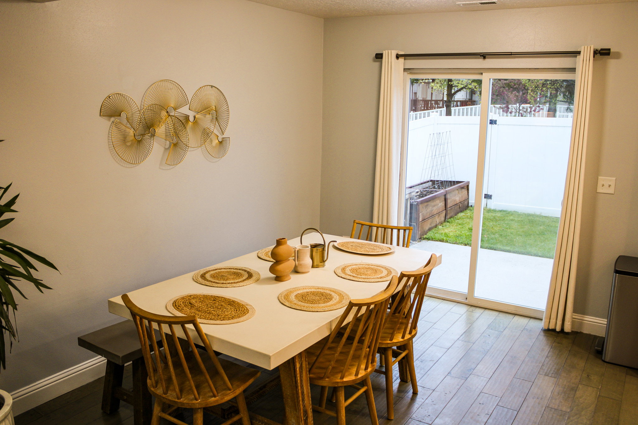 Dining area with dark wood finished floors and a textured ceiling