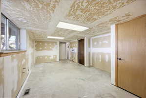 View of unfinished basement kitchen