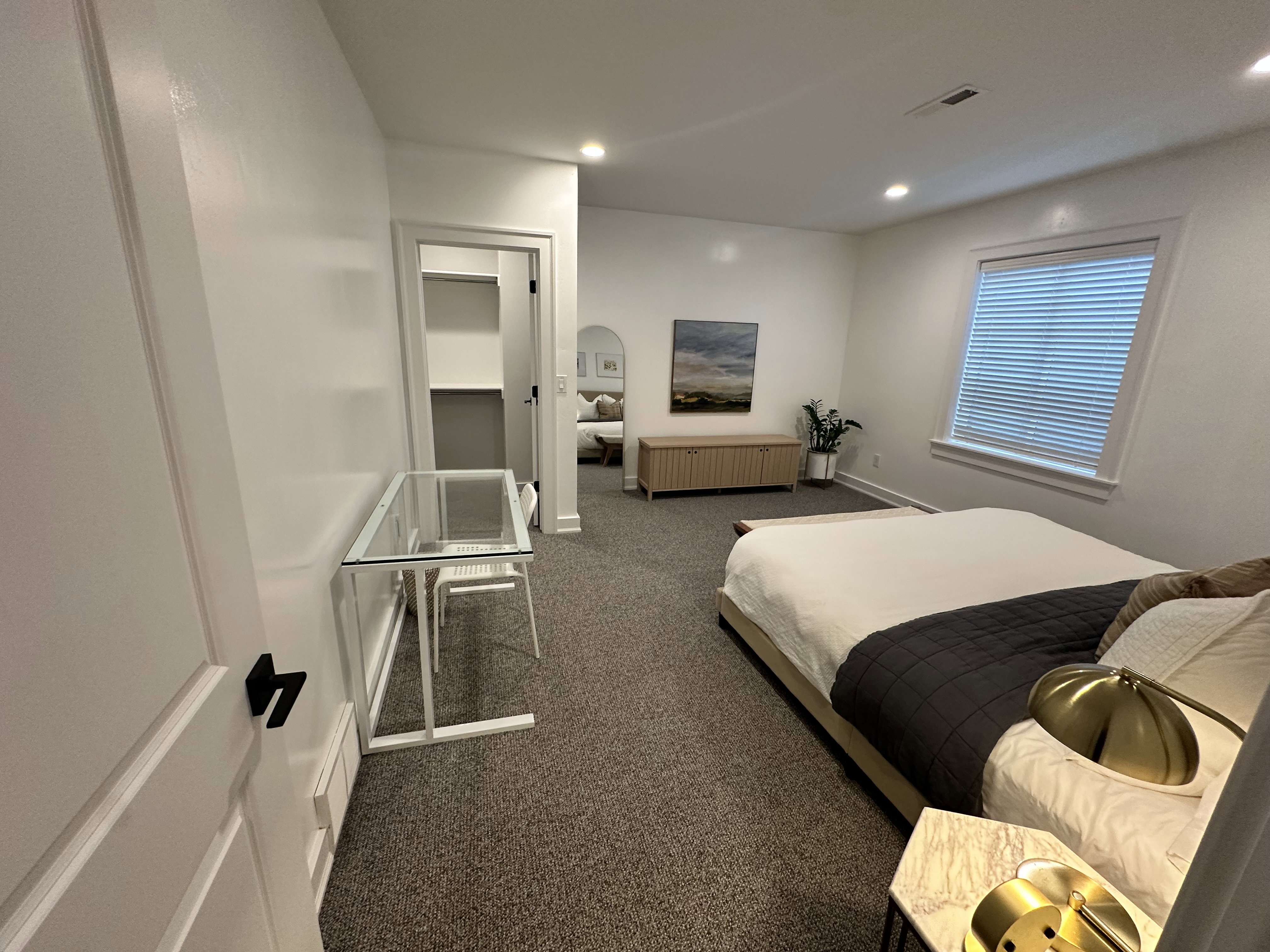 #2 Basement Bedroom with dark carpet and recessed lighting