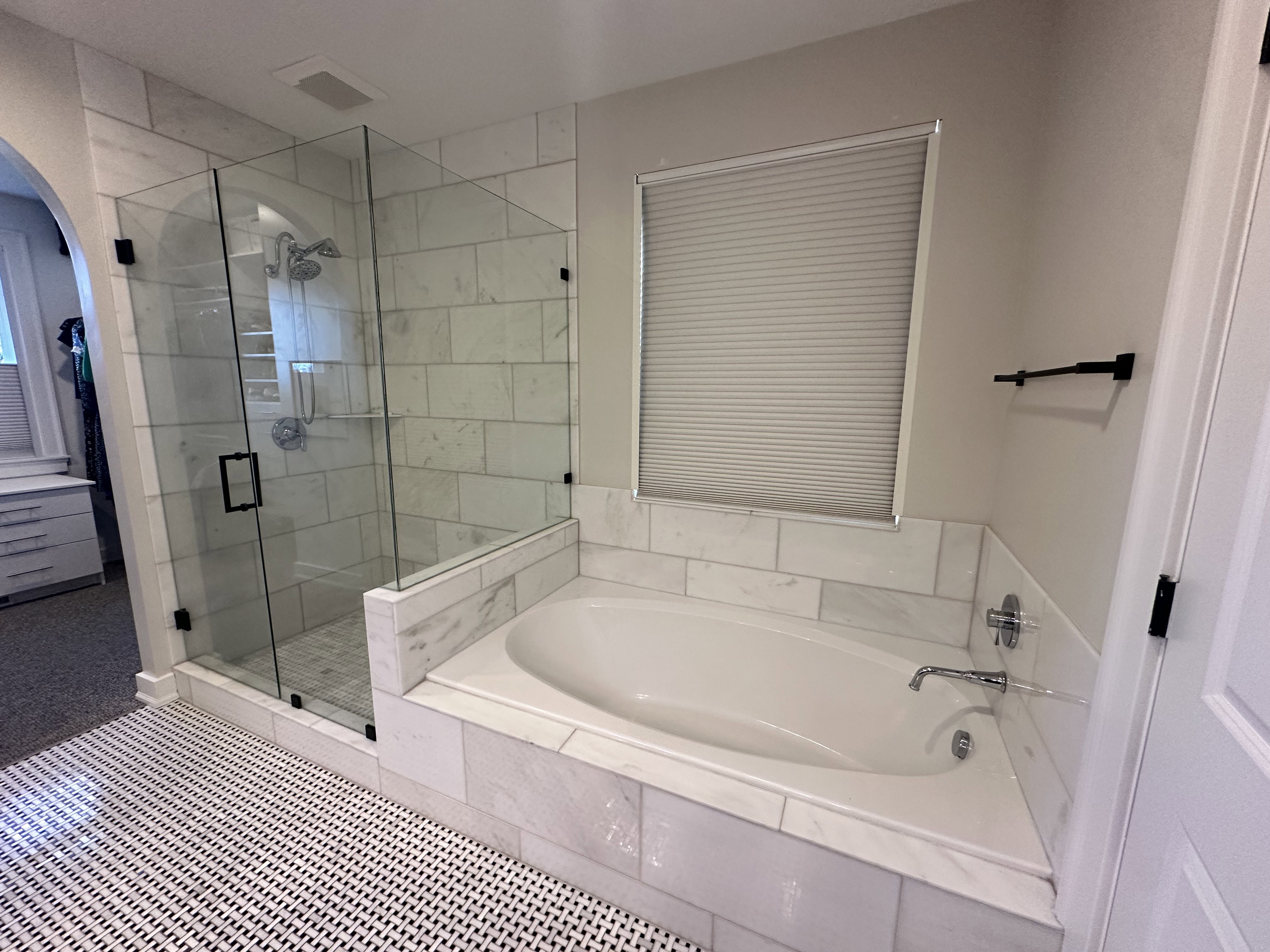 Master Bathroom with a stall shower and a bath