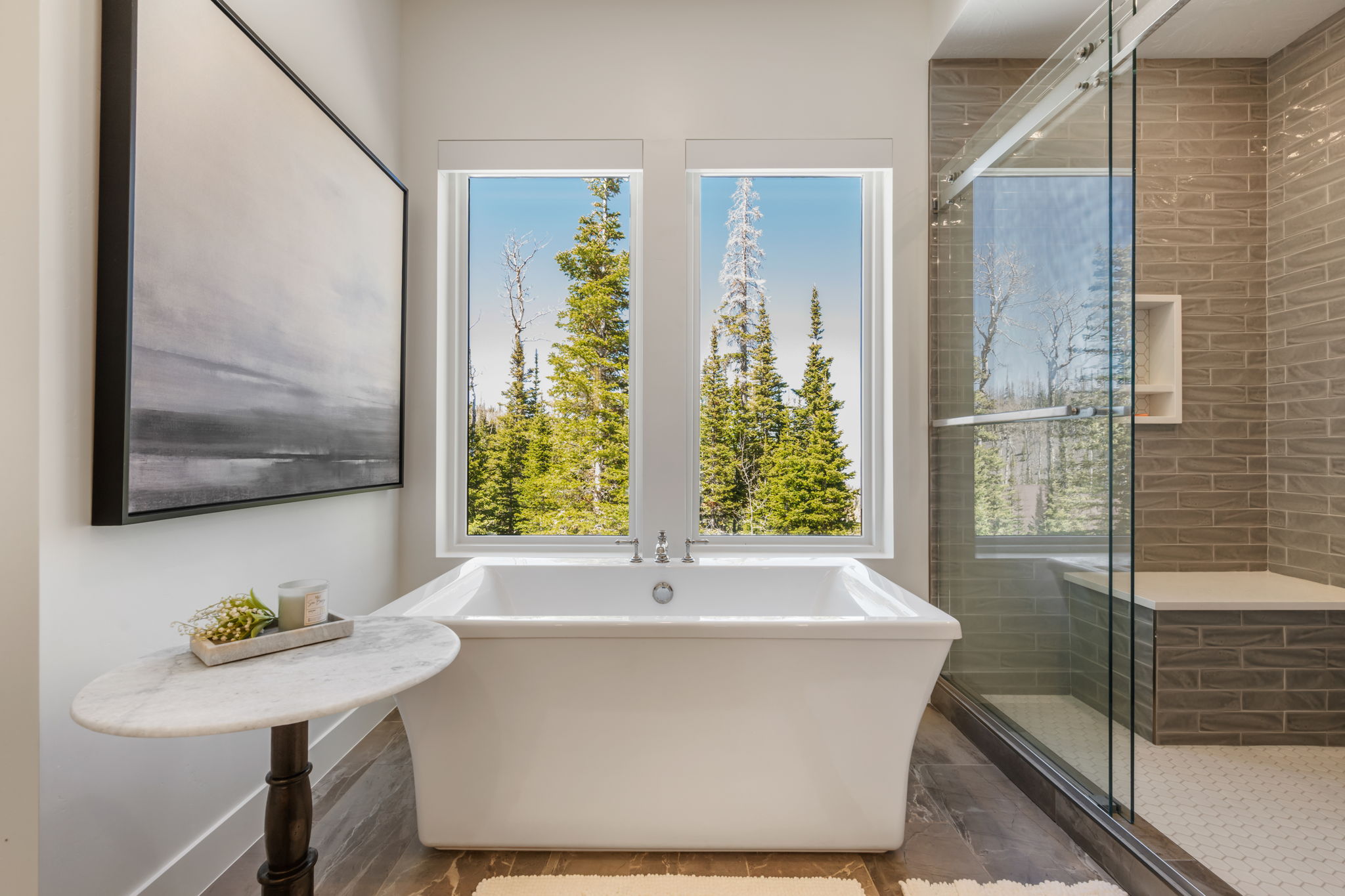 Full bathroom featuring a freestanding bath and a shower stall