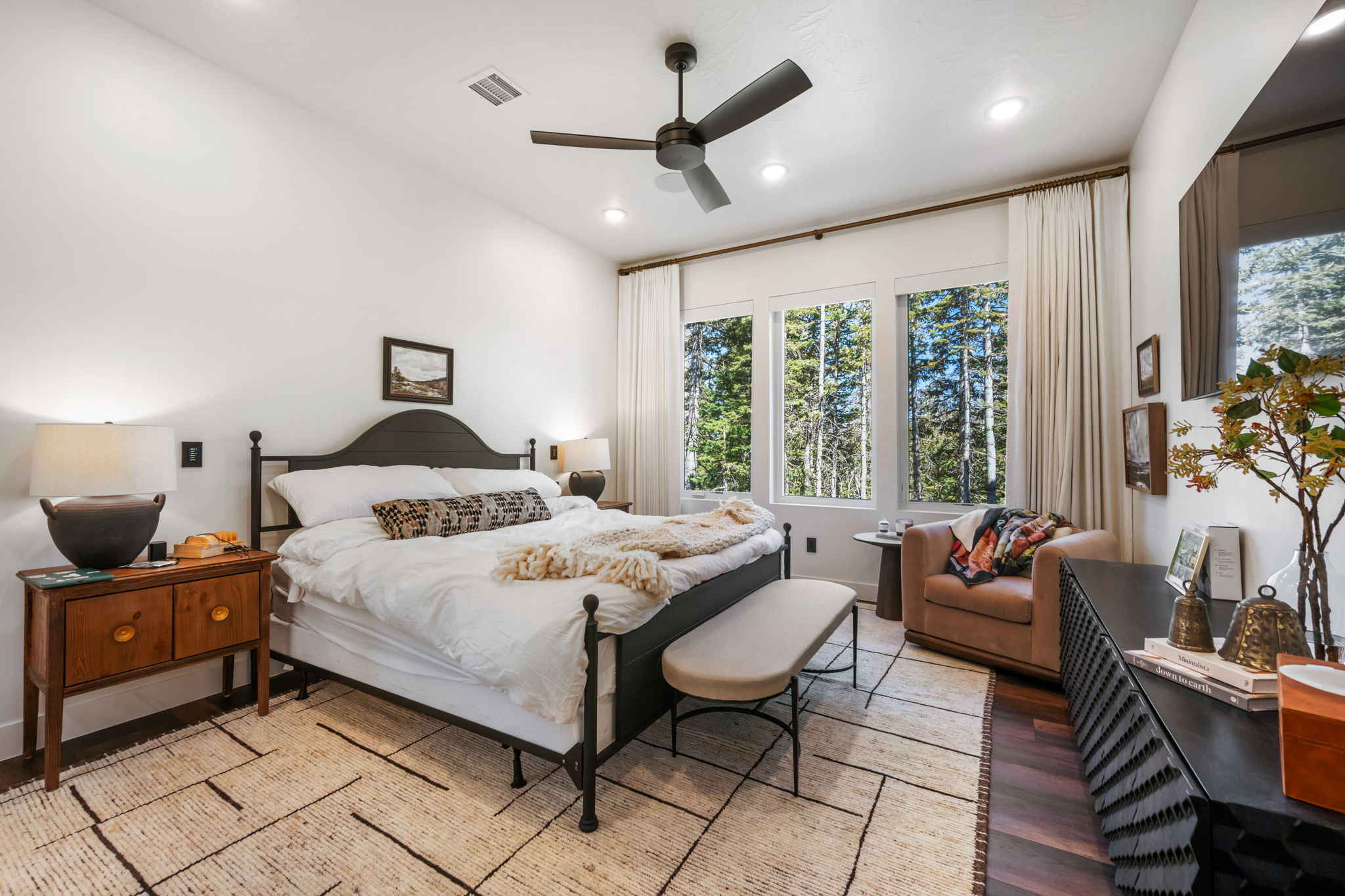 Bedroom featuring ceiling fan, wood finished floors, and recessed lighting