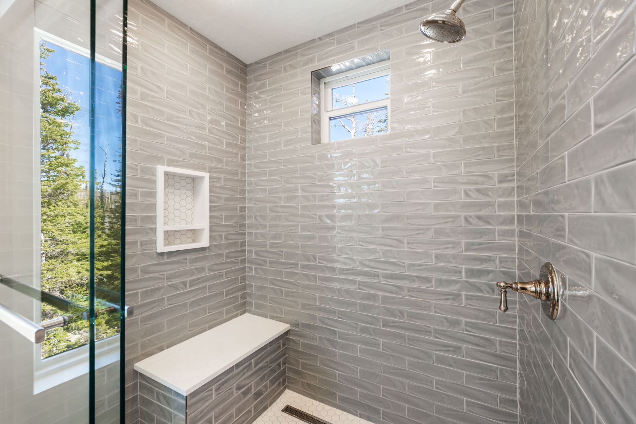 Bathroom featuring tiled shower
