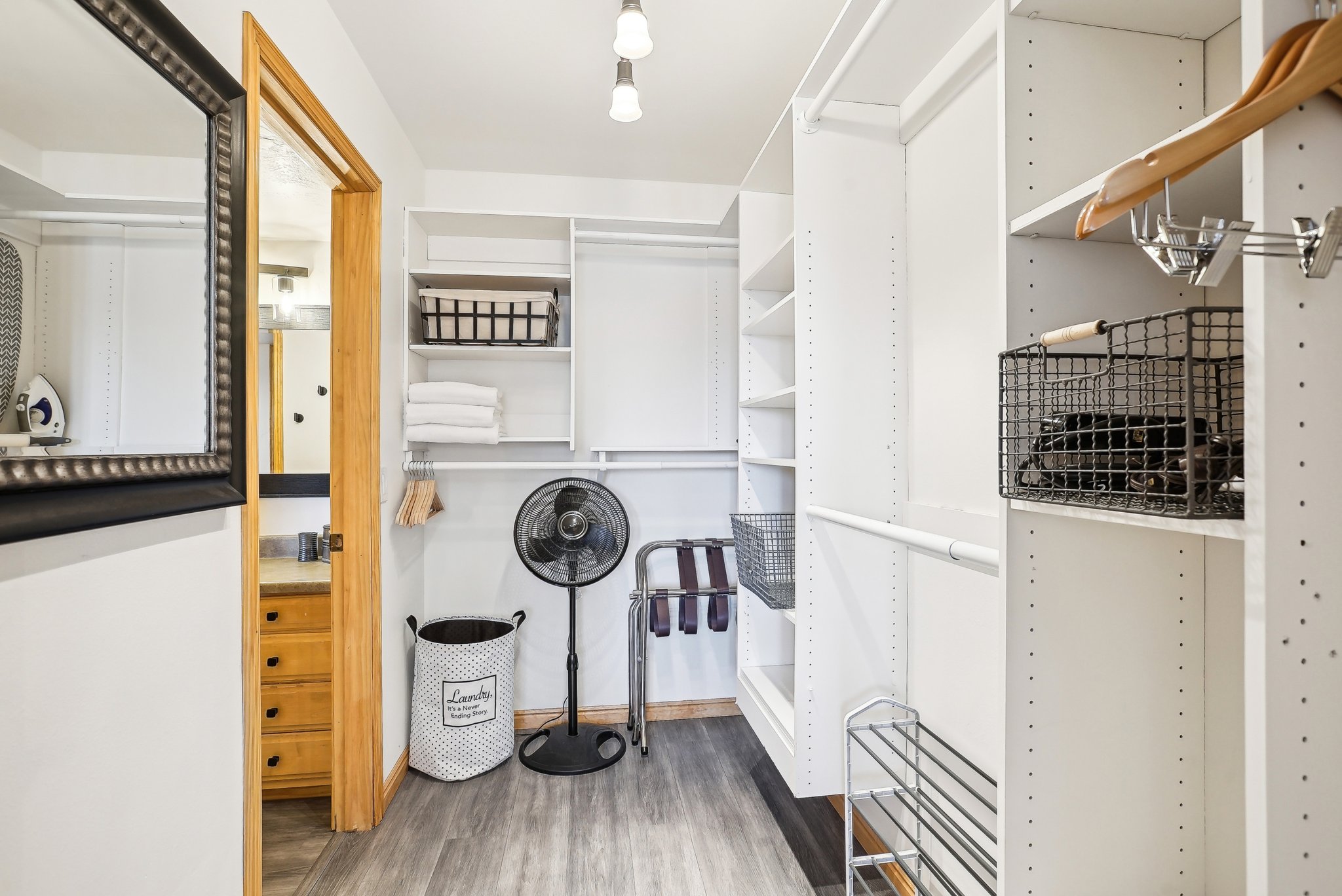 Walk in closet featuring light wood finished floors