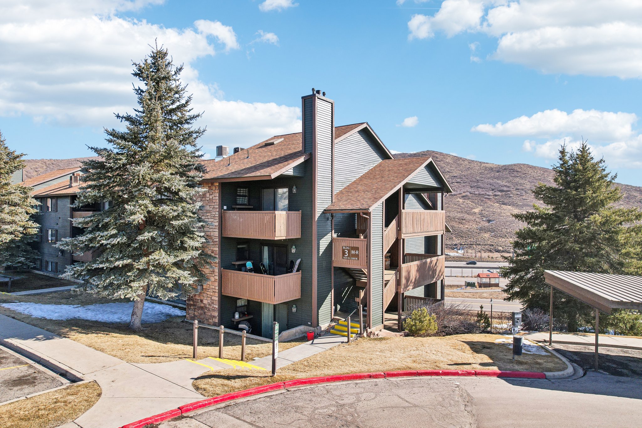 View of apartment building / complex with a mountain view