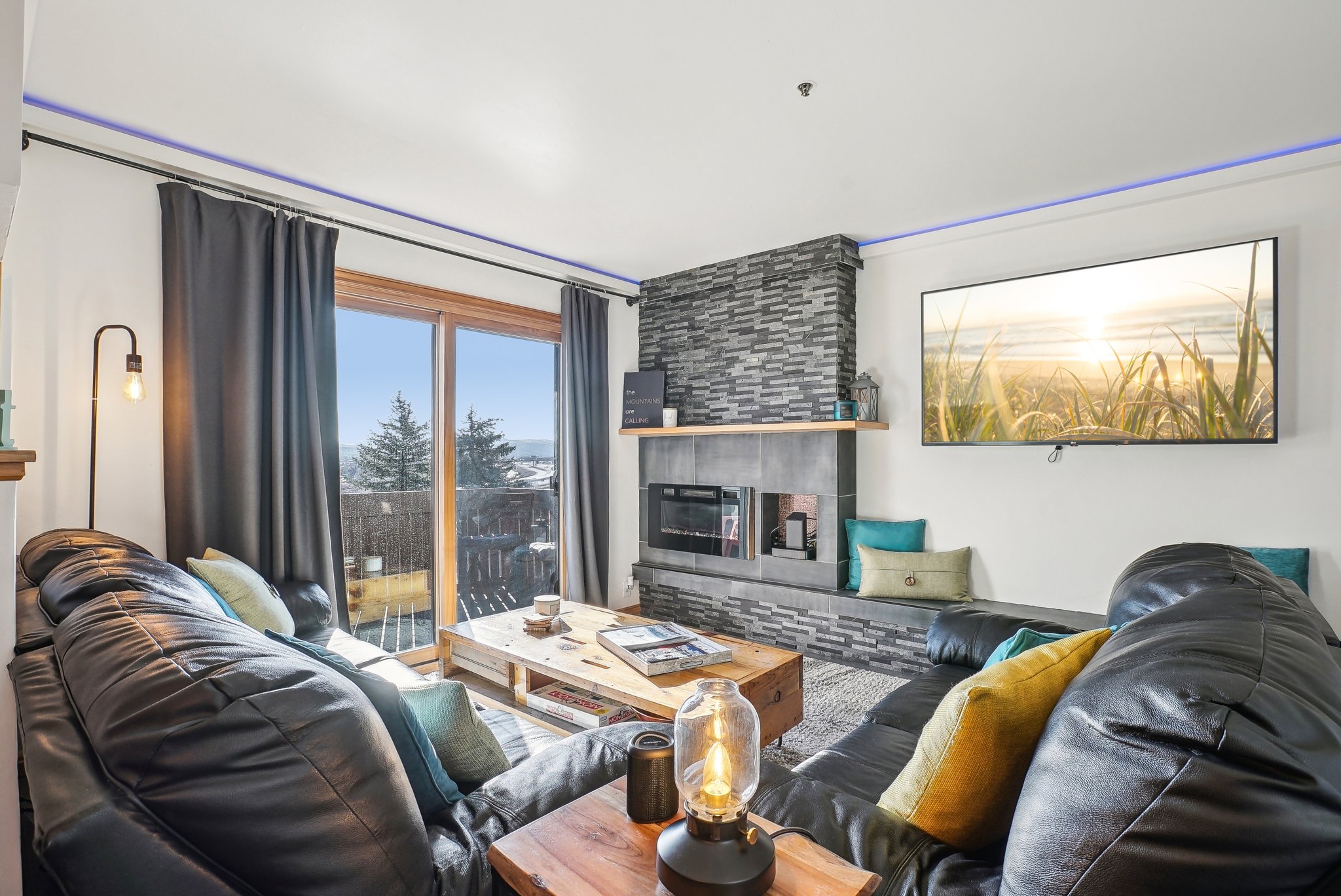 Living area with a tiled fireplace