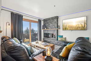 Living area with a tiled fireplace