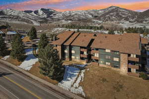 Snowy aerial view with a mountain view