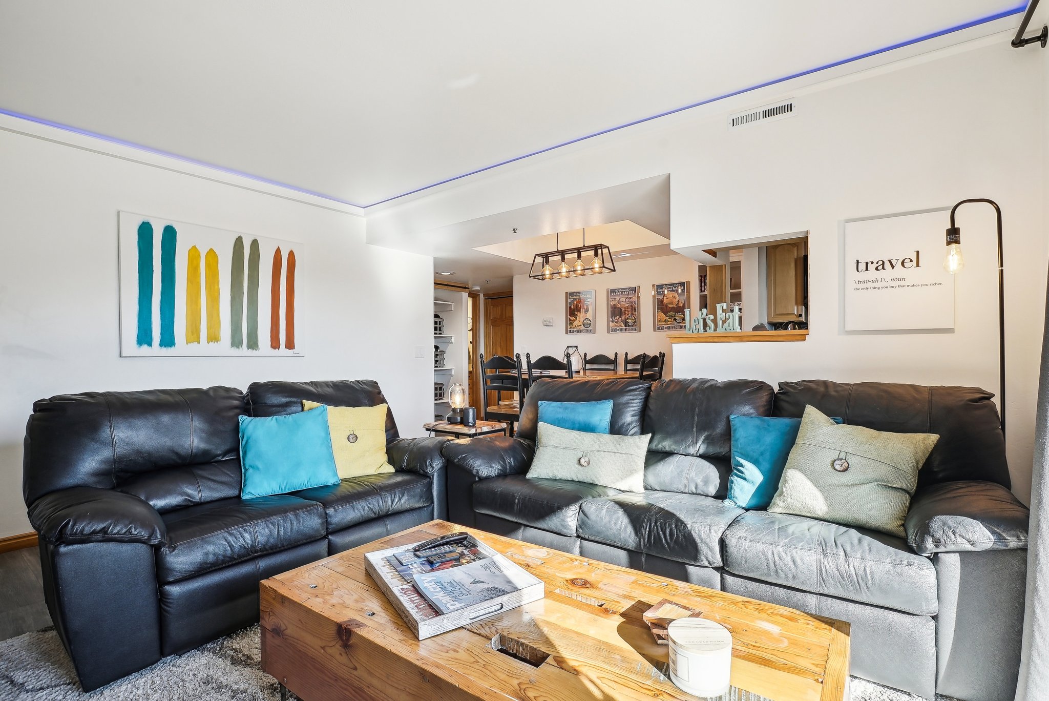 Living room featuring a chandelier